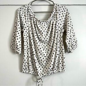 Women’s size XL white top with black flowers